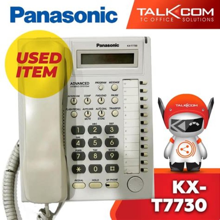 How do I transfer a call extension to another Panasonic KX T7730?