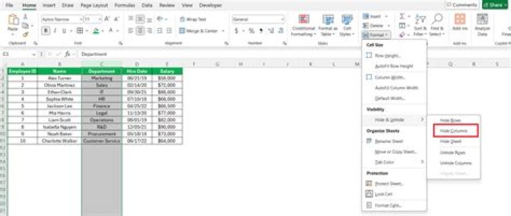 How do you automatically hide columns in Excel based on cell value?
