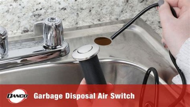 How does an air switch work for a garbage disposal?