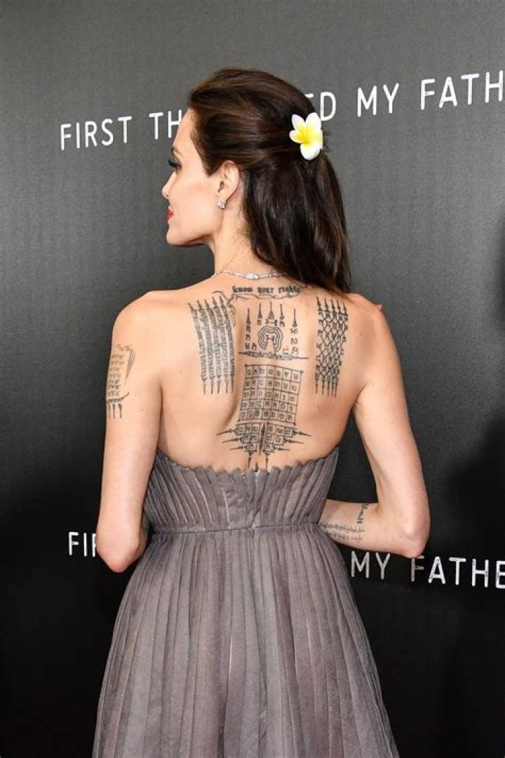 How many tattoos does Angelina Jolie have?