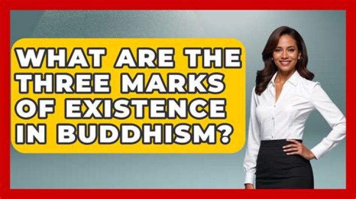 What are the three marks of existence in Buddhism?